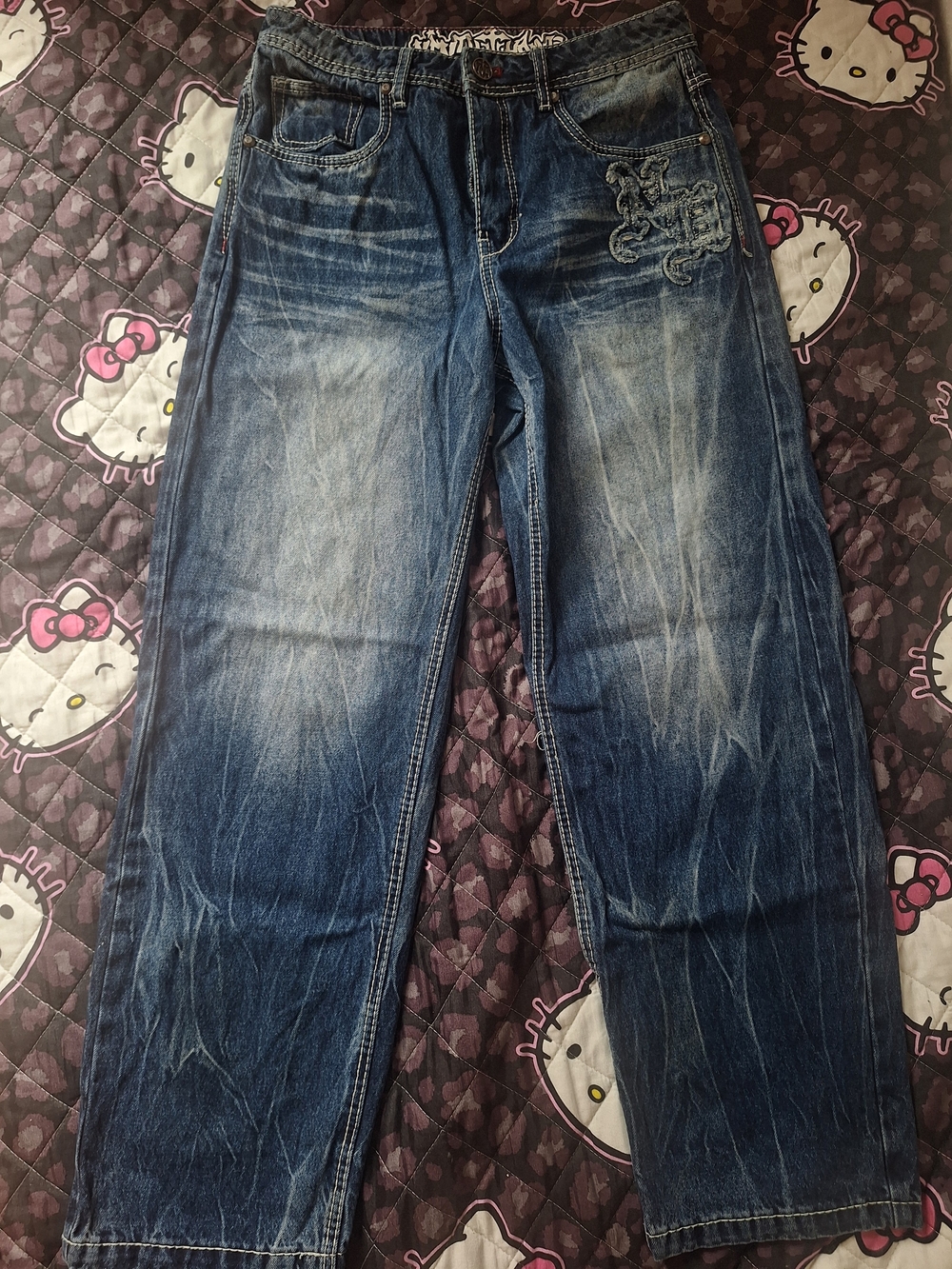 Womans Blue Washed Denim Jeans with Embroidered Detail